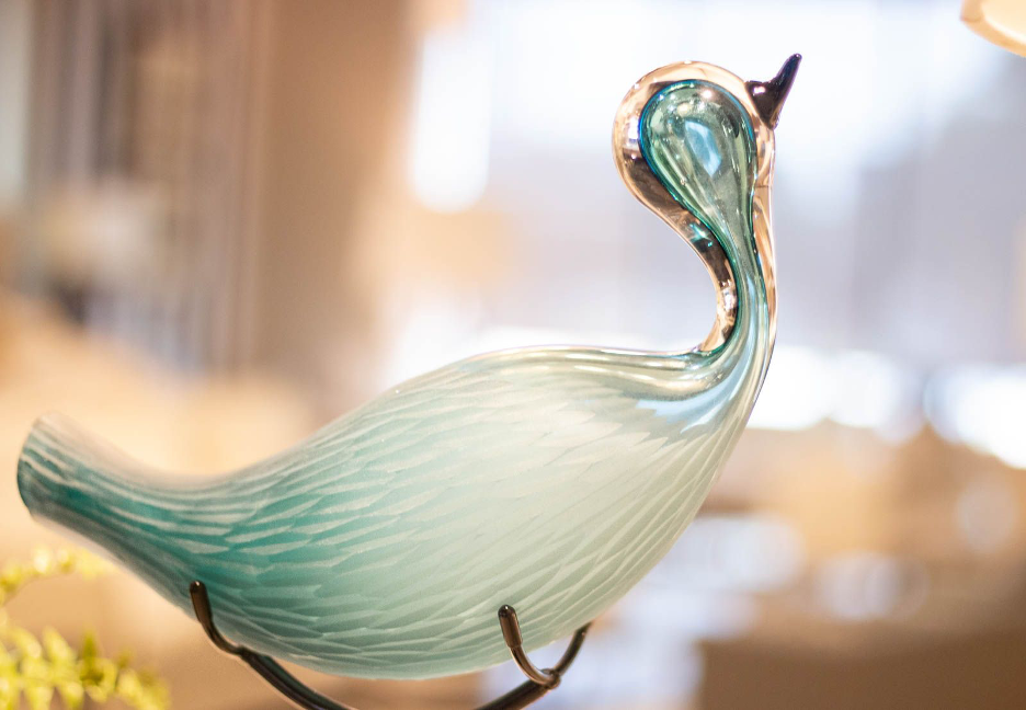 A glass bird decor piece