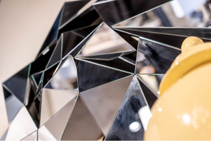 A mirrored structural wall decor