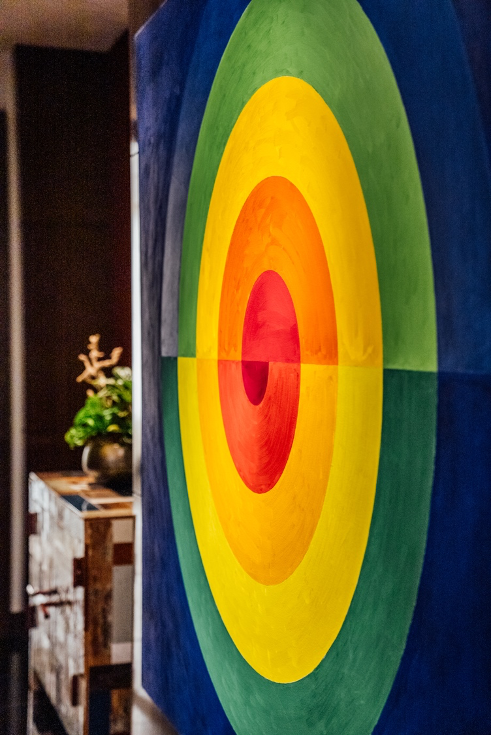 Artwork with a rainbow circle