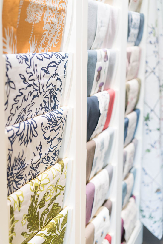 A wall of different fabrics